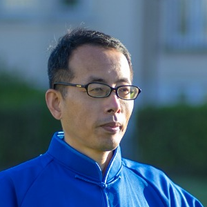 qigong master with glasses during practice