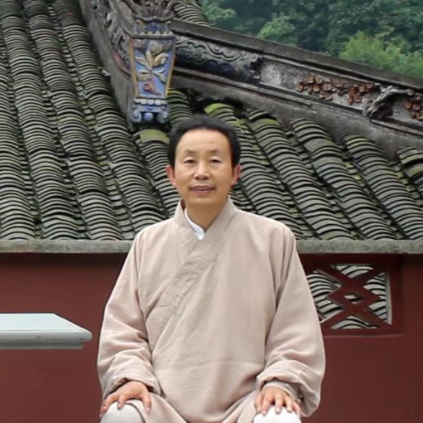 qigong master in sitting position